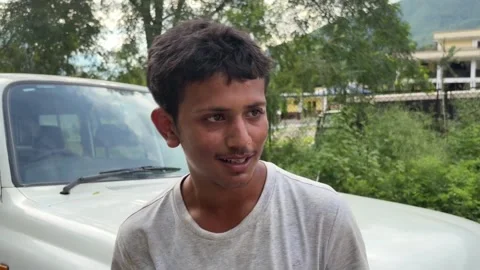 16-year-old boy escapes with grandfather on shoulders from flood that devastated 스톡 동영상 344196108