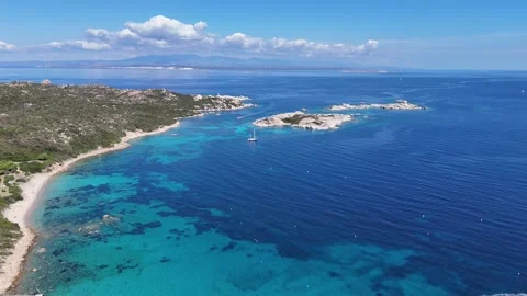 160-Drone Ascending Over Turquoise Mediterranean Sea with Dark Depth Patches Stock Footage 334365197