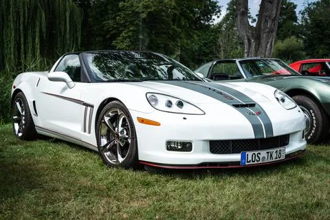 DIEDERSDORF,  GERMANY  -  AUGUST  21,  2021:  The  sports  car  Chevrolet  Corvette  Grand  Sport  Convertible.  The  exhibition  of  "US  Car  Classics". xkwx america,  american,  auto,  automobile,  automotive,  car,  classic,  design,  diedersdorf,  exhibition,  germany,  machine,  model,  style,  transport,  transportation,  us,  usa,  vehicle,  engine,  sports  car,  Chevrolet,  Corvette,  Grand  Sport,  Convertible,  cabrio,  cabriolet,  2-door,  c6,  front,  GM,  General  Motors,  muscle  car