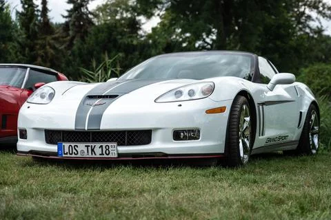 DIEDERSDORF,  GERMANY  -  AUGUST  21,  2021:  The  sports  car  Chevrolet  Corvette  Grand  Sport  Convertible.  The  exhibition  of  "US  Car  Classics". xkwx america,  american,  auto,  automobile,  automotive,  car,  classic,  design,  diedersdorf,  exhibition,  germany,  machine,  model,  style,  transport,  transportation,  us,  usa,  vehicle,  engine,  sports  car,  Chevrolet,  Corvette,  Grand  Sport,  Convertible,  cabrio,  cabriolet,  2-door,  c6,  front,  GM,  General  Motors,  muscle  car