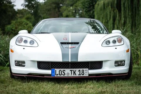 DIEDERSDORF,  GERMANY  -  AUGUST  21,  2021:  The  sports  car  Chevrolet  Corvette  Grand  Sport  Convertible.  The  exhibition  of  "US  Car  Classics". xkwx america,  american,  auto,  automobile,  automotive,  car,  classic,  design,  diedersdorf,  exhibition,  germany,  machine,  model,  style,  transport,  transportation,  us,  usa,  vehicle,  engine,  sports  car,  Chevrolet,  Corvette,  Grand  Sport,  Convertible,  cabrio,  cabriolet,  2-door,  c6,  front,  GM,  General  Motors,  muscle  car