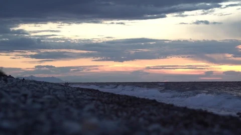 1623. Beach at Sunset Waves and Moutains 4K Stock Footage 88729716