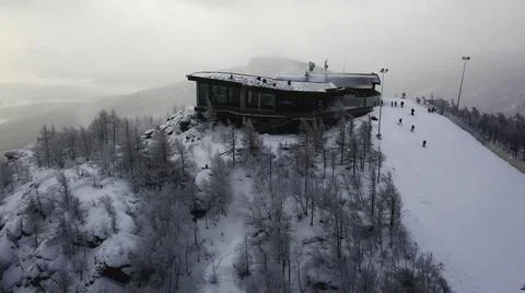 Video: Aerial view of the ski resort with snowy mountain slopes and ...