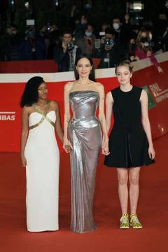 ROME, ITALY - OCTOBER 24: (L-R) Zahara Marley Jolie-Pitt, Angelina Jolie and Shiloh Jolie-Pitt attend the red carpet of the movie Eternals during the 16th Rome Film Fest 2021. xkwx Eternals, red carpet, RomaFF16, rome film fest, rome film fest 2021, Auditorium Parco della Musica, film industry, film, celebrity, movie star, cinema, entertainment