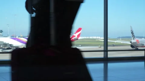 16/4/26: Editorial: Quantas plane in front of fuel storage, Iran war shortages Stock Footage 332902718
