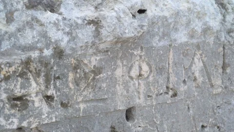 16784 Closer look of the small holes on the rocks in the greek theatre in Sir Stock Footage 86856653