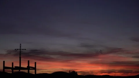 1679. Christian Cross in the Sunset Clouds 4K Stock Footage 88733650