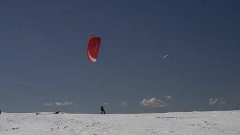 1684. Red Snow Kite in the Wind 4K Stock Footage 88734262