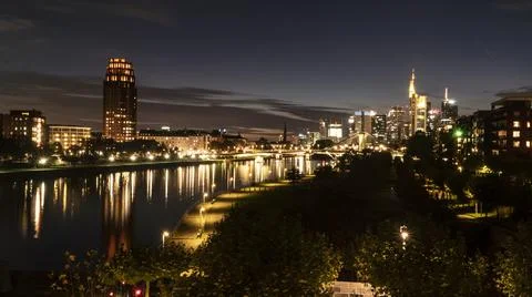 FRANKFURT  am  MAIN,  GERMANY  2019  OCTOBER  05  Illuminated  Cityscape  Night  View  Frankfurt  am  Maine  Germany xkwx architecture,  background,  brick,  bridge,  river,  main,  building,  buildings,  business,  centre,  city,  cityscape,  dark,  downtown,  editorial,  europe,  european,  famous,  frankfurt,  frankfurt  am  main,  mainhattan,  germany,  illuminated,  park,  sky,  clouds,  skyline,  hotel,  lindner,  commerzbank
