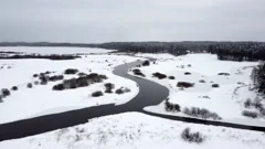 flight over the river not frozen in winter, hilly landscape, pushkin mountains