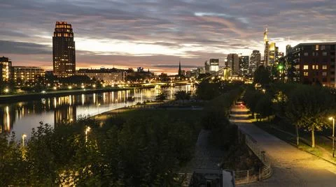 FRANKFURT  am  MAIN,  GERMANY  2019  OCTOBER  05  Illuminated  Cityscape  Night  View  Frankfurt  am  Maine  Germany xkwx architecture,  background,  brick,  bridge,  river,  main,  building,  buildings,  business,  centre,  city,  cityscape,  dark,  downtown,  editorial,  europe,  european,  famous,  frankfurt,  frankfurt  am  main,  mainhattan,  germany,  illuminated,  park,  sky,  clouds,  skyline,  hotel,  lindner,  commerzbank