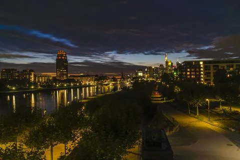 FRANKFURT  am  MAIN,  GERMANY  2019  OCTOBER  05  Illuminated  Cityscape  Night  View  Frankfurt  am  Maine  Germany xkwx architecture,  background,  brick,  bridge,  river,  main,  building,  buildings,  business,  centre,  city,  cityscape,  dark,  downtown,  editorial,  europe,  european,  famous,  frankfurt,  frankfurt  am  main,  mainhattan,  germany,  illuminated,  park,  sky,  clouds,  skyline,  hotel,  lindner,  commerzbank