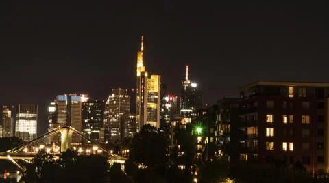 FRANKFURT  am  MAIN,  GERMANY  2019  OCTOBER  05  Illuminated  Cityscape  Night  View  Frankfurt  am  Maine  Germany xkwx architecture,  background,  brick,  bridge,  river,  main,  building,  buildings,  business,  centre,  city,  cityscape,  dark,  downtown,  editorial,  europe,  european,  famous,  frankfurt,  frankfurt  am  main,  mainhattan,  germany,  illuminated,  park,  sky,  clouds,  skyline,  hotel,  lindner,  commerzbank