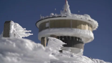 1694. Focus on Mountain Tower with Snow Forms 4K Stock Footage 88735090