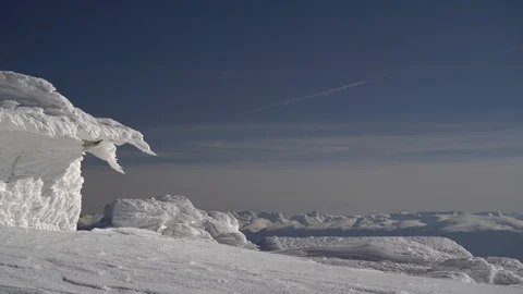 1699. Snow and Ice Forms and Mountain Range in the Distance 4K Stock Footage 88735504