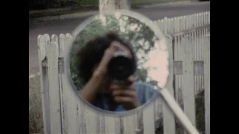 16mm cameraman reflection in mirror Video stock 129861285