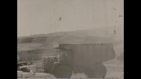 16mm dump truck drives at mining site Stock Footage 129856483