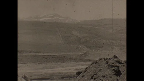 16mm excavating vehicles in surface mine Stock Footage 129845086