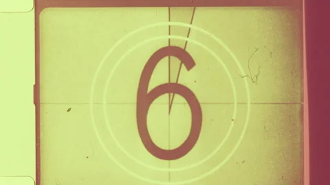 16mm film showing framing and bleeding edge. Countdown clock from 8 to 2. Stock Footage