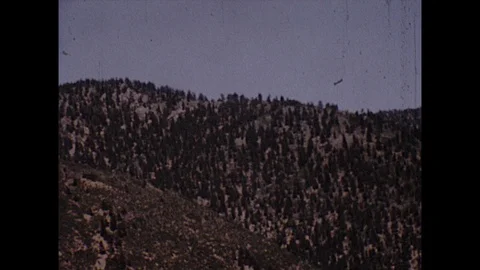 16mm pan of mountainous landscape Stock-Footage 129865300