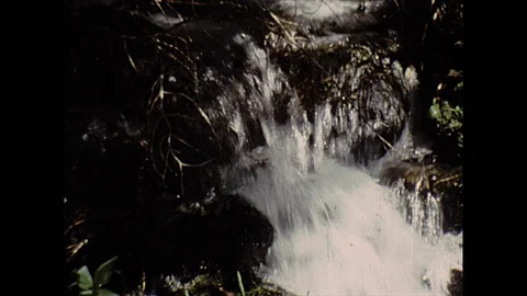 16mm small waterfall, babbling brook Stock Footage 129857041