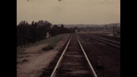 16mm tilt up train tracks Stock Footage 129842419