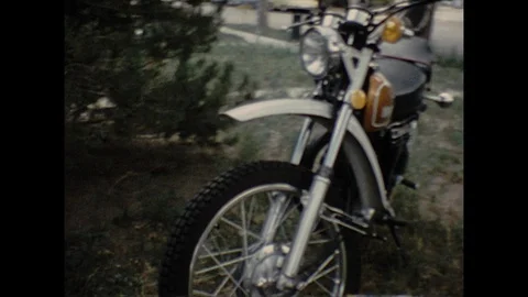 16mm various angles of Yamaha motorcycle Video stock 129864026