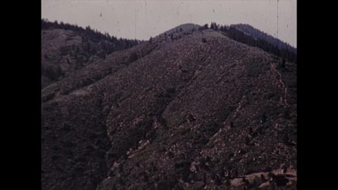 16mm wide shot of mountain Stock Footage 129849678