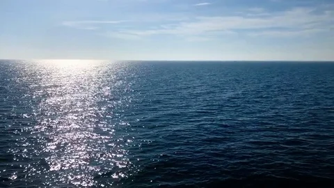 17 second video deep blue ocean sun refection shimmering on water surface Stock Footage 96518596