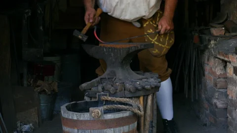 1700s Blacksmith making S hook Stock Footage 168087075