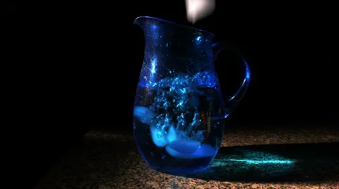 1715 Blue Pitcher with Ice Falling into Water, 4K Stock Footage 38844734