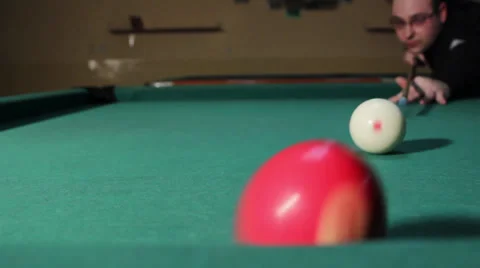 17/35 Man playing billiard. Player is taking a shot and put ball in the hole. 스톡 동영상 36430467