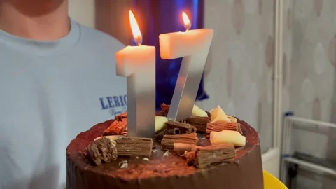 17th Birthday Cake with candles Stock Footage 336930448