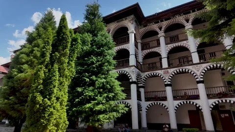 18 August 2026 Sofia, Bulgaria. Historic arched building behind green trees Stock-Footage 344651572