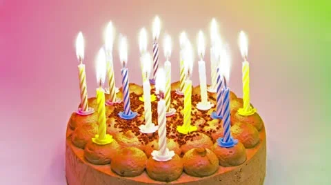 18 Candles burn down on Birthdaycake Stock Footage 10852247