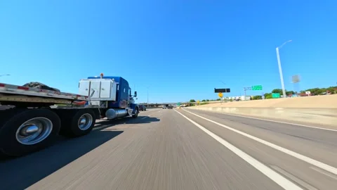 18 wheeler flat bed truck semi on the highway Stock Footage 248159150