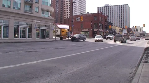 18 wheelers driving through a down town main street. #01-26 Stock-Footage 35607405
