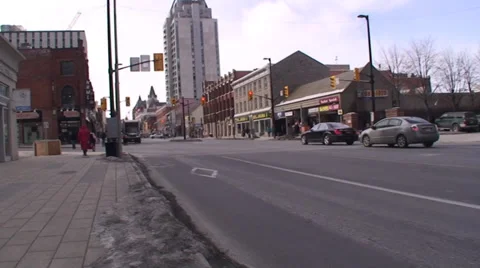 18 wheelers driving through a down town main street. #10-26 Stock Footage 35629894