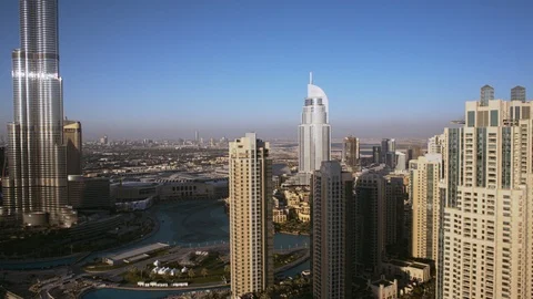 180 degree pan right to left across Downtown Dubai looking from Business Bay at Stock Footage 98950111