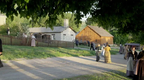 1830s Townspeople Walk in Historic Village Stock Footage 43504799