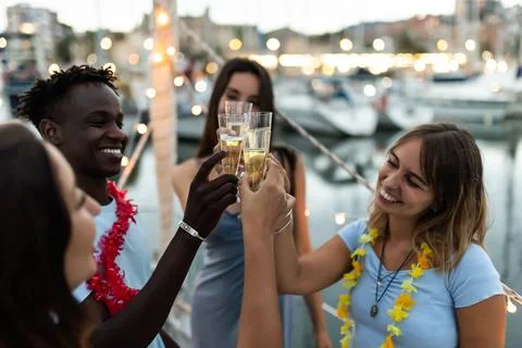 Group of multiracial friends having fun on boat party in summer vacation - Happy diverse young people cheering with champagne on a birthday celebration xkwx friends, happy, boat, party, diverse, celebrate, young, fun, champagne, holidays, vacation, celebration, people, group, drink, man, woman, lights, family, multiracial, smile, cheerful, cheering, toast, bonding, cheers, multicultural, adult, harbour, together, friendship, enjoy, colleague, guy, african, diversity, weekend, laughing, multiethnic, laugh, usa, young adult, event, festive, having fun, united states, african american