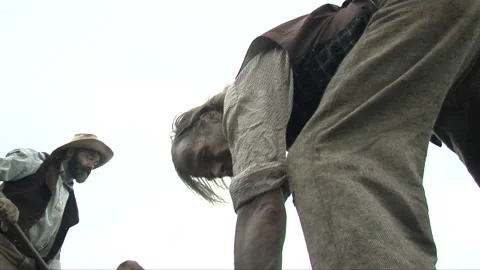 1849 - Two Western Men digging for gold with picks and shovels Stock Footage 171186296