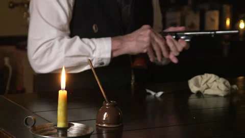 1880s man removes bullets focus on inkwell Stock Footage 340239852