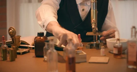 1890 scientist working with a microscope Stock Footage 122053881