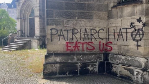 19, July, 2026, Berlin Germany: Patriarchy Anarchy Graffiti On An Old Church Stock Footage 340108103