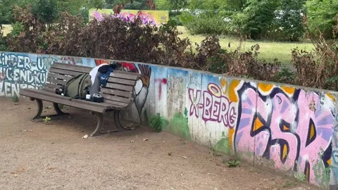 19, July, 2026,  Berlin Germany: Kreuzberg Park Bench And Graffiti Wall Stock Footage 340108125