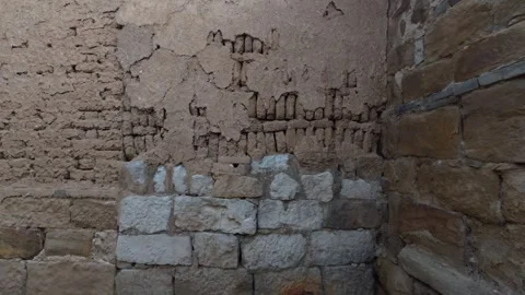19 Old rammed earth and stone compound wall in ancient Chinese village Stock Footage 345885616