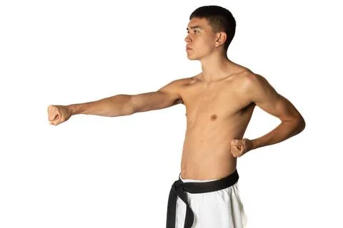19 Year Old Practacing a Karate Stomach Punch Stock Photos
