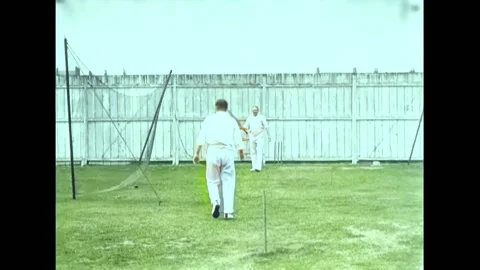 1901 - Cricketer A.N. Hornby practices batting. Stock Footage 246358686