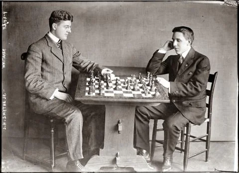 1910s or 1920s. Two men playing chess. Foto stock